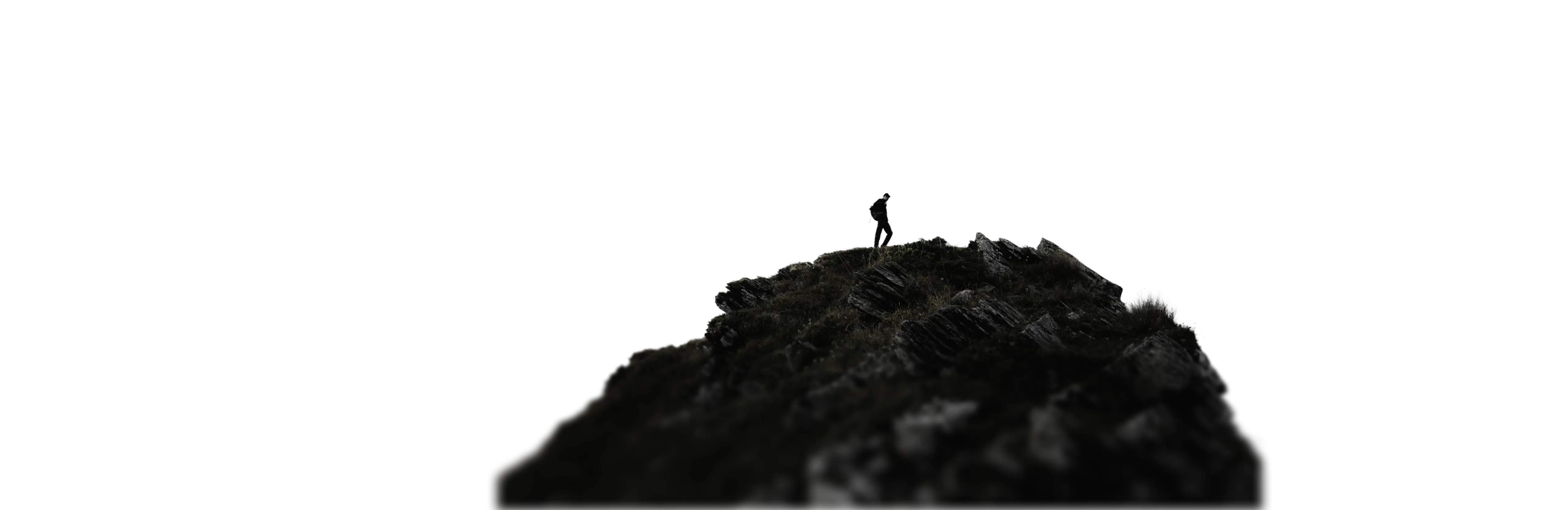 man on top of a mountain