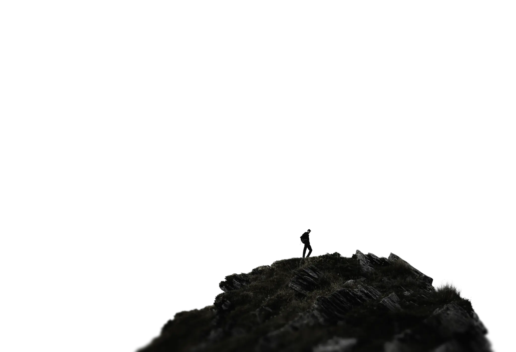 man on top of a mountain