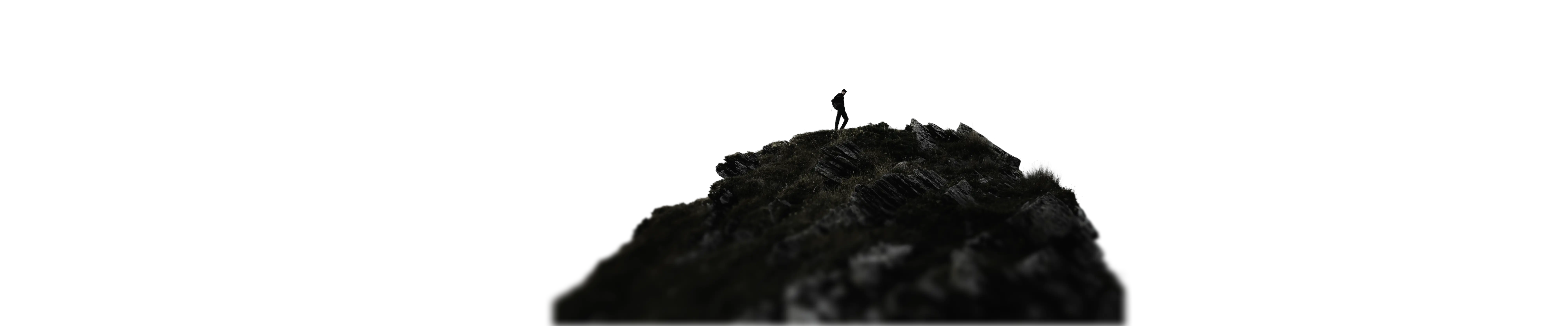 man on top of a mountain