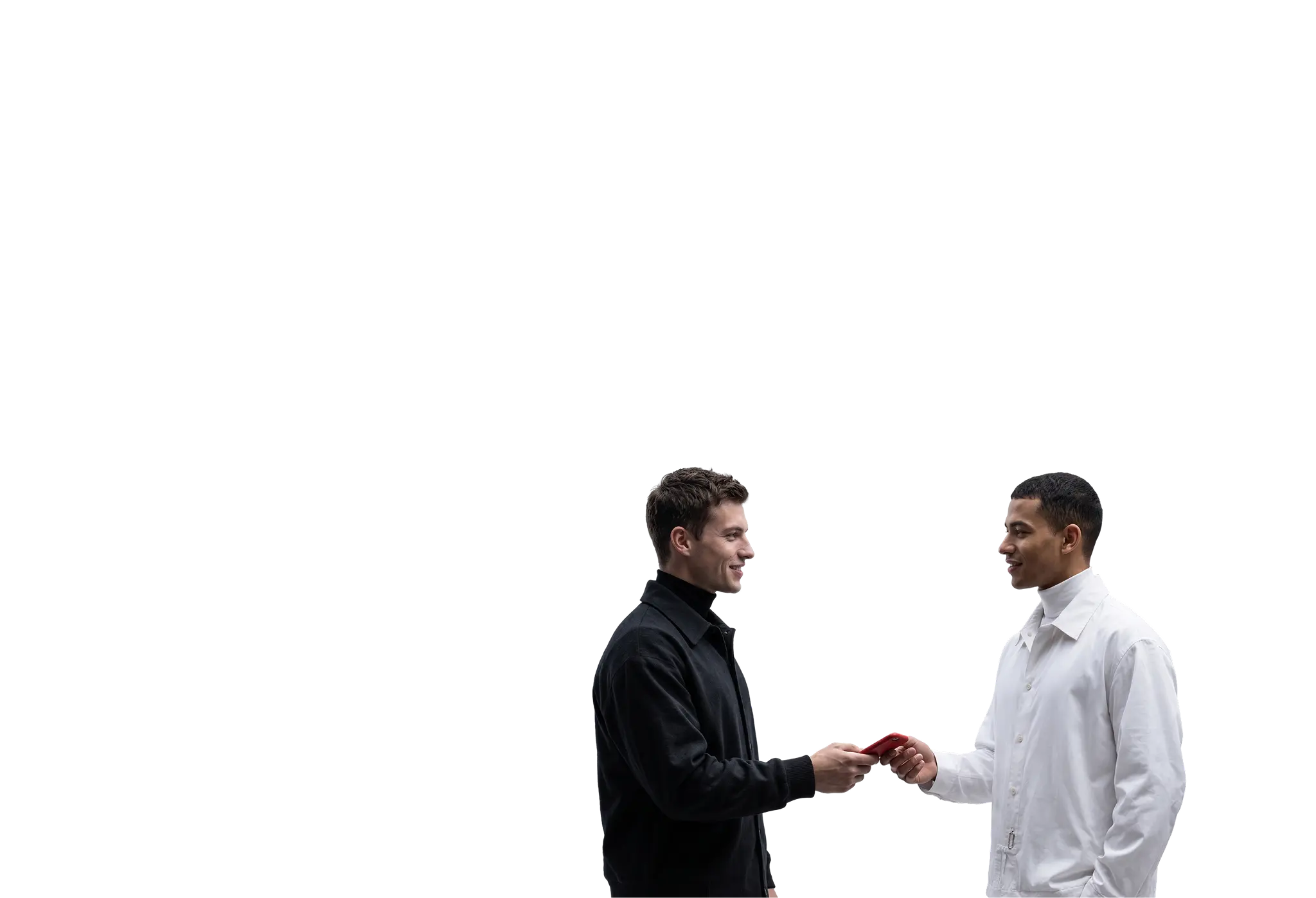 two people exchanging a smartphone