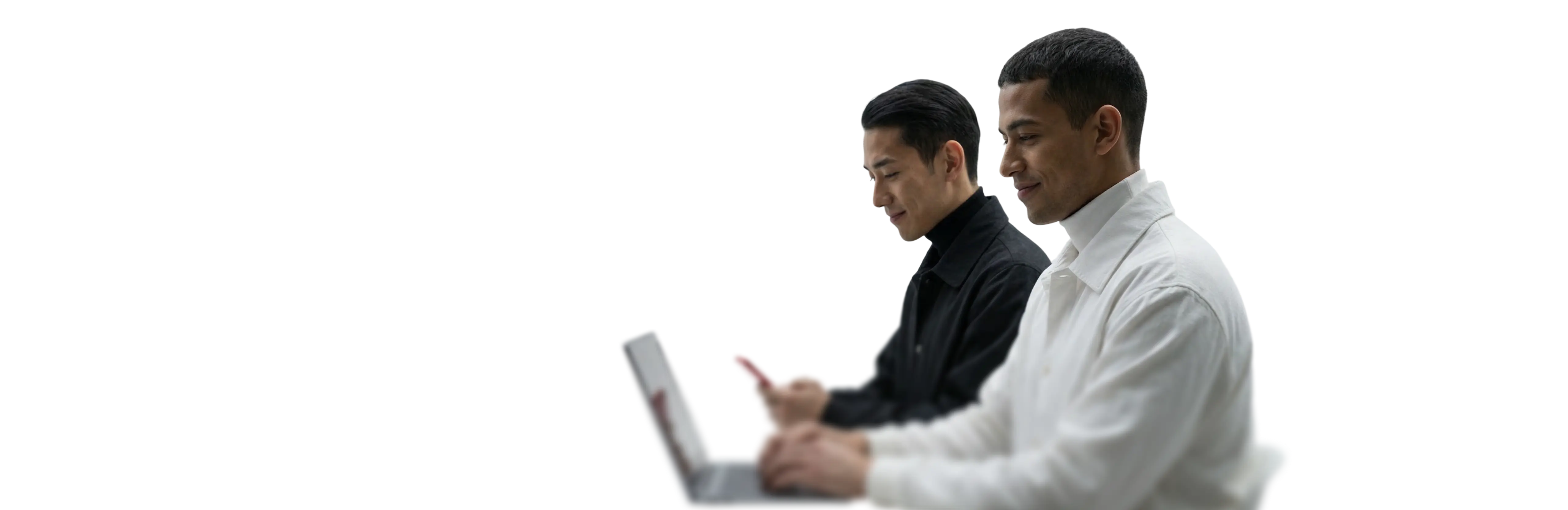 people using trading app on laptops and smartphones