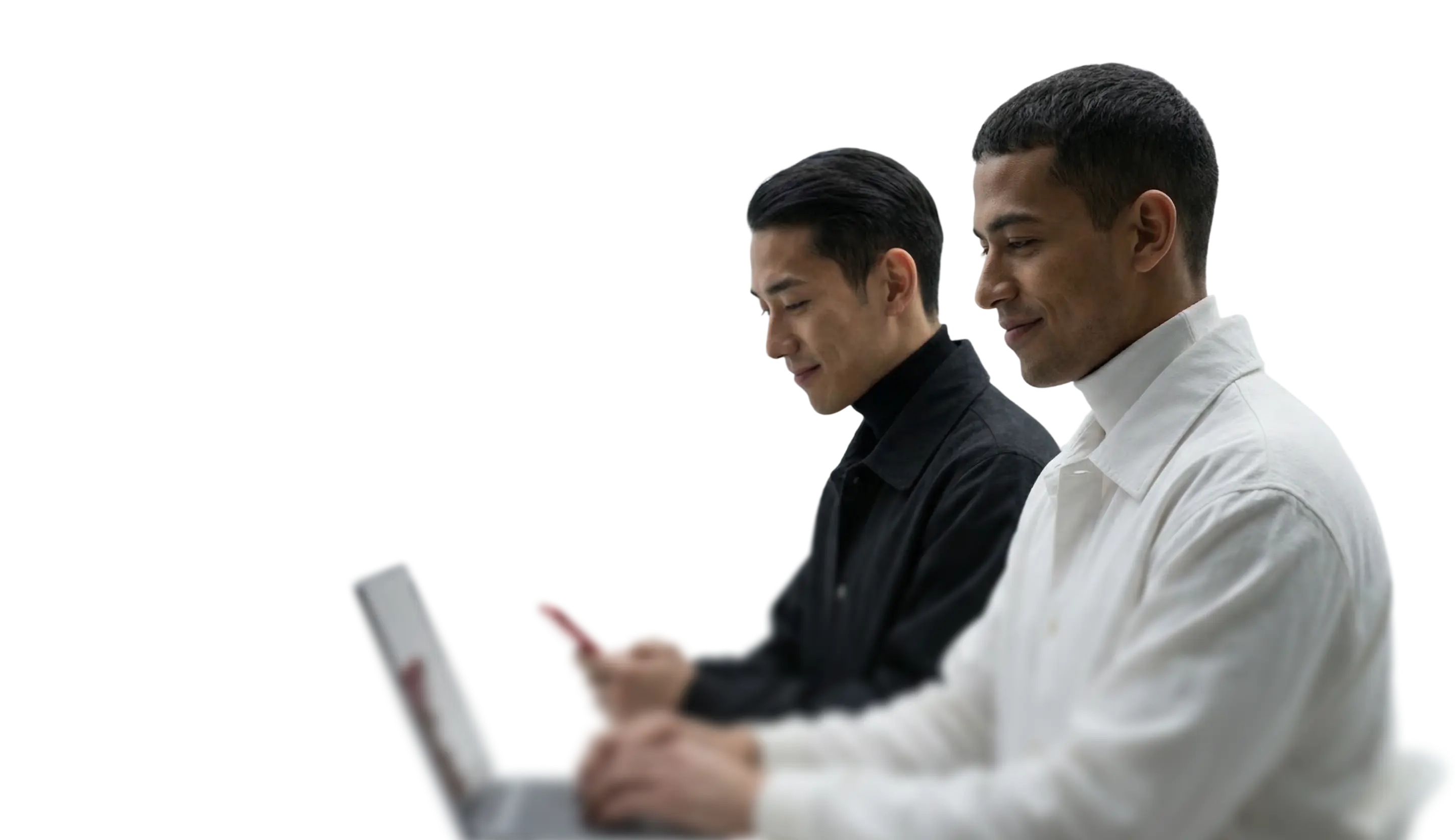 people using trading app on laptops and smartphones